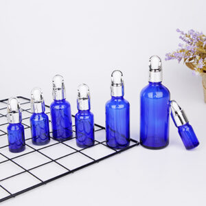 blue color glass essential oil bottle