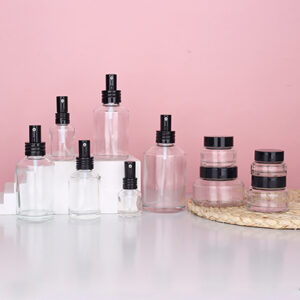 Slanted Shoulder Transparent Glass Cosmetic Bottles