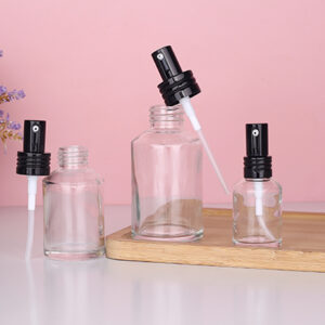 Slanted Shoulder Transparent Glass Cosmetic Bottles