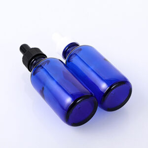 cobalt blue boston round glass essential oil bottle