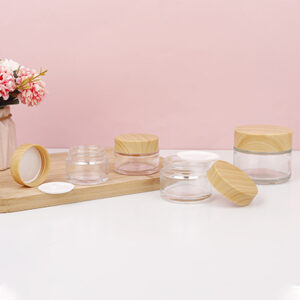 transparent glass cosmetic jar with plastic wooden lid