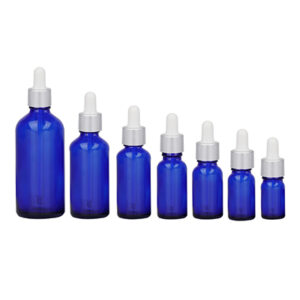 blue essential oil glass dropper bottle