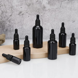 black cosmetic essential oil glass bottle
