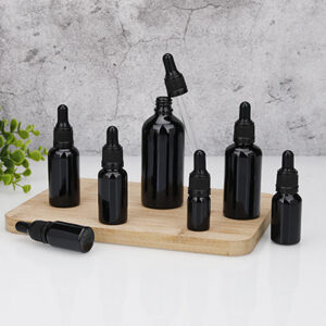 black cosmetic essential oil glass bottle