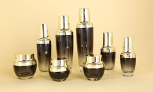 black glass cosmetics bottle and jae set