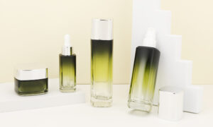 green gradient glass cosmetics bottles and jars