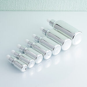 silver color cosmetic serum dropper bottle