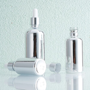 silver color cosmetic serum dropper bottle