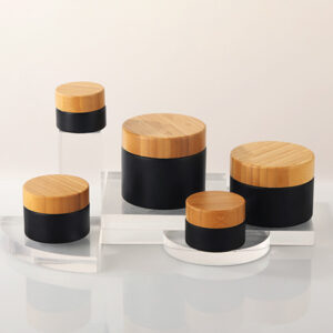 frosted black glass cosmetic cream jar with bamboo lid