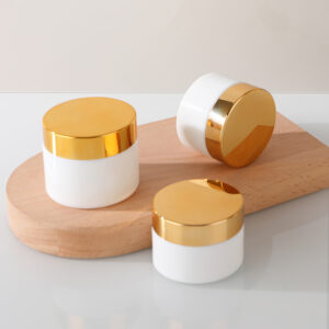 opal white glass cosmetic jar with gold lid