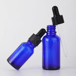 blue essential oil bottle