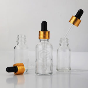 clear glass essential oil bottle