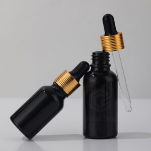 essential oil black glass bottle