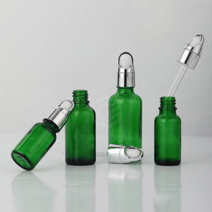 essential oil green glass bottle