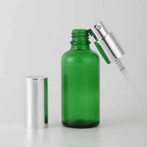 glass spray bottle green cosmetic pump bottle