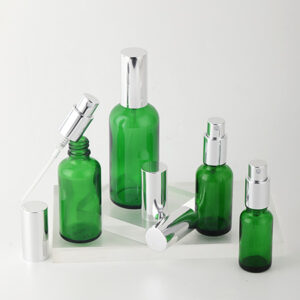 glass spray bottle green cosmetic pump bottle