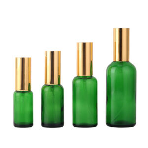 green glass round spray bottle