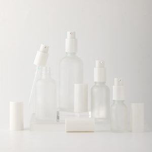 frosted glass pump serum bottle