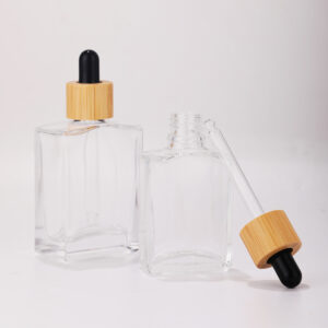 glass serum bottle with bamboo pipette