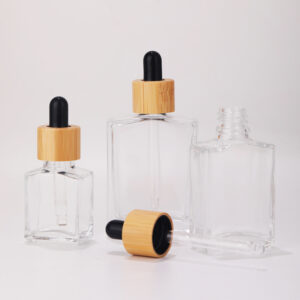 glass serum bottle with bamboo pipette