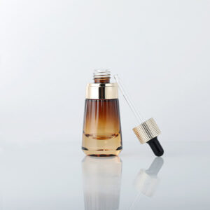 glass bottle with push button dropper