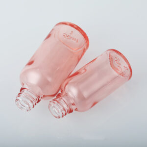 pink essential oil glass dropper bottle