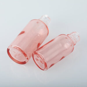 pink essential oil glass dropper bottle