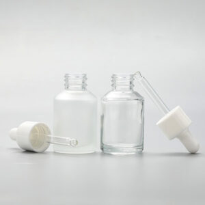 cosmetic glass bottle with plastic dropper