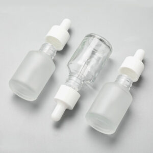 cosmetic glass bottle with plastic dropper