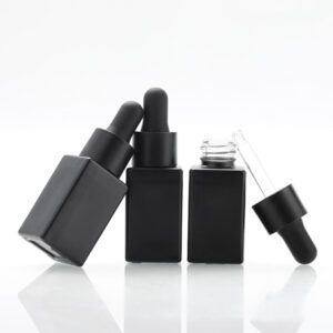 black glass serum bottle