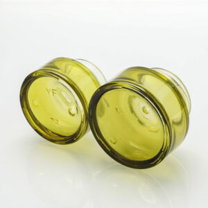 empty slanted shoulder green glass cosmetic jar