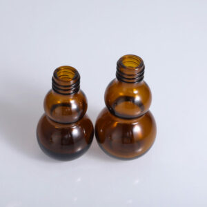 brown essential oil bottle