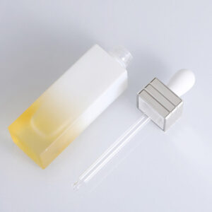 cosmetic glass serum bottle with dropper