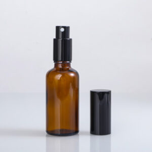 black glass cosmetic spray bottle