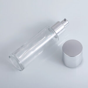 transparent glass cosmetic bottle with pump