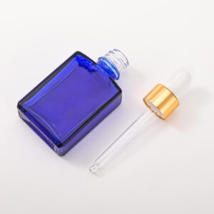 cobalt blue skin care glass dropper bottle