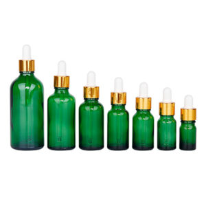 green essential oil glass dropper bottle